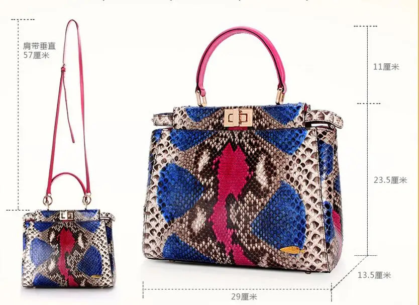 A multicolor snakeskin-patterned handbag with pink handles and a pink shoulder strap, shown with dimension annotations on a white background.