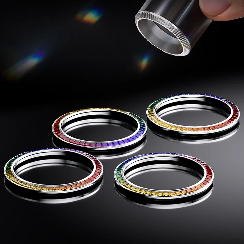 Set of rainbow-studded rings on a dark background