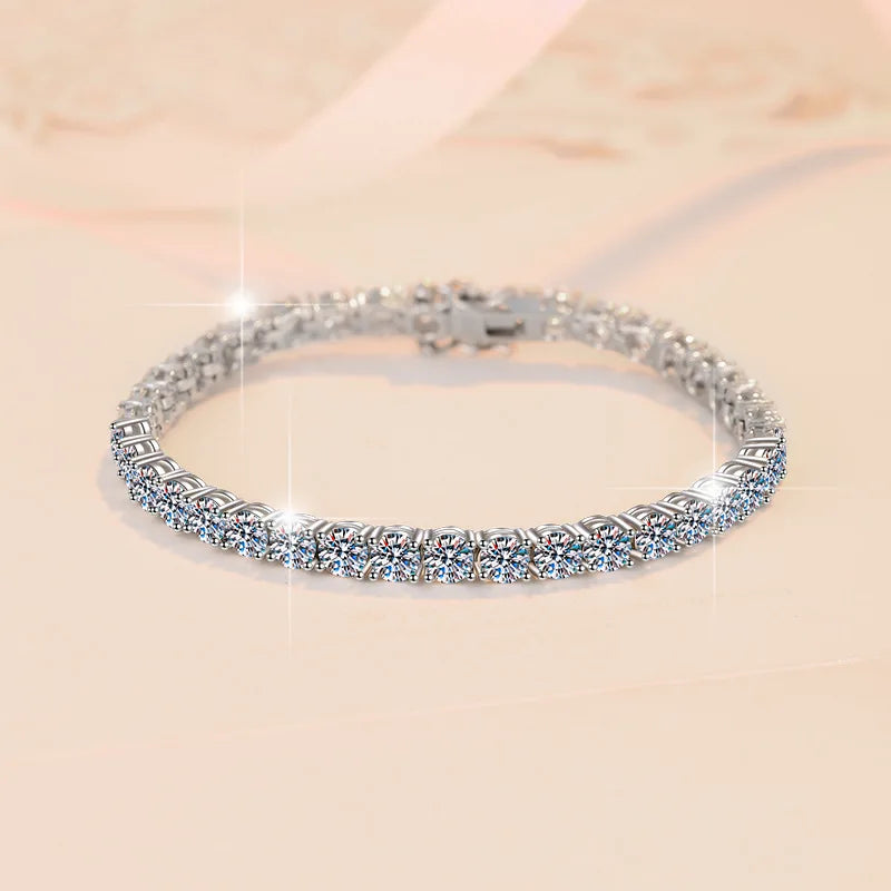 Silver bracelet with clear stones on a beige background