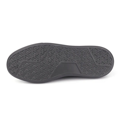 The black textured rubber outsole of a shoe, shown from a top-down view against a plain white background.