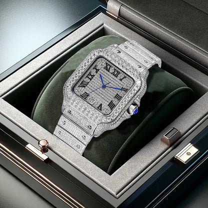 A luxury watch with a diamond-encrusted silver-toned case and matching bracelet, displayed inside an open presentation box with a dark green cushion.