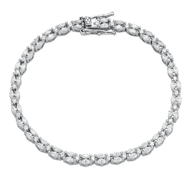 A silver tennis bracelet featuring a double row of marquise-cut and oval-cut clear stones, displayed on a solid white background.
