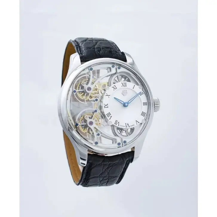 A luxury skeleton watch with a silver-tone case, white dial, blue hands, and a black alligator leather strap, shown against a light gray background.