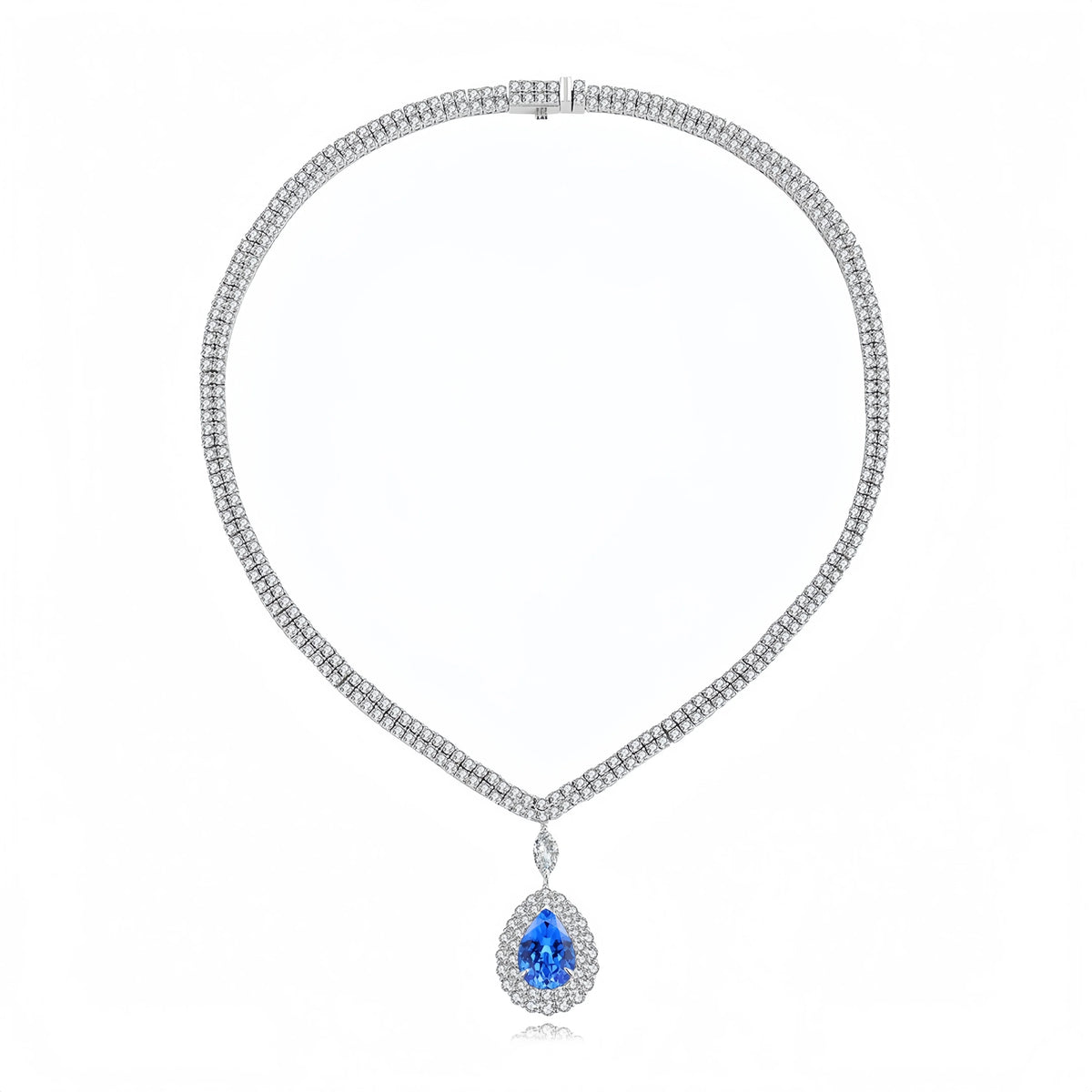 A silver-toned diamond necklace with a teardrop-shaped blue gemstone pendant, displayed on a clean white background.