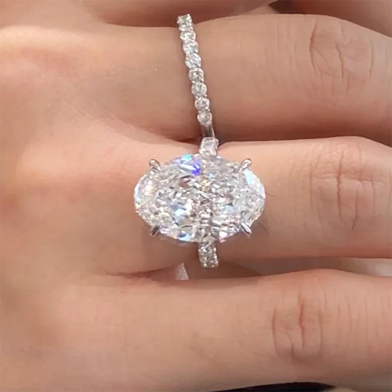 Diamond ring on a finger with a close-up view