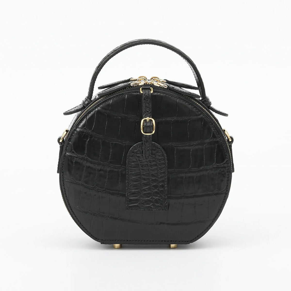 A black crocodile-embossed leather handbag with a top handle, gold-tone hardware, and a front hanging tag, photographed on a clean white background.