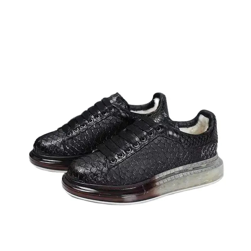 Black textured sneakers on a white background