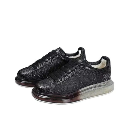 Black textured sneakers on a white background