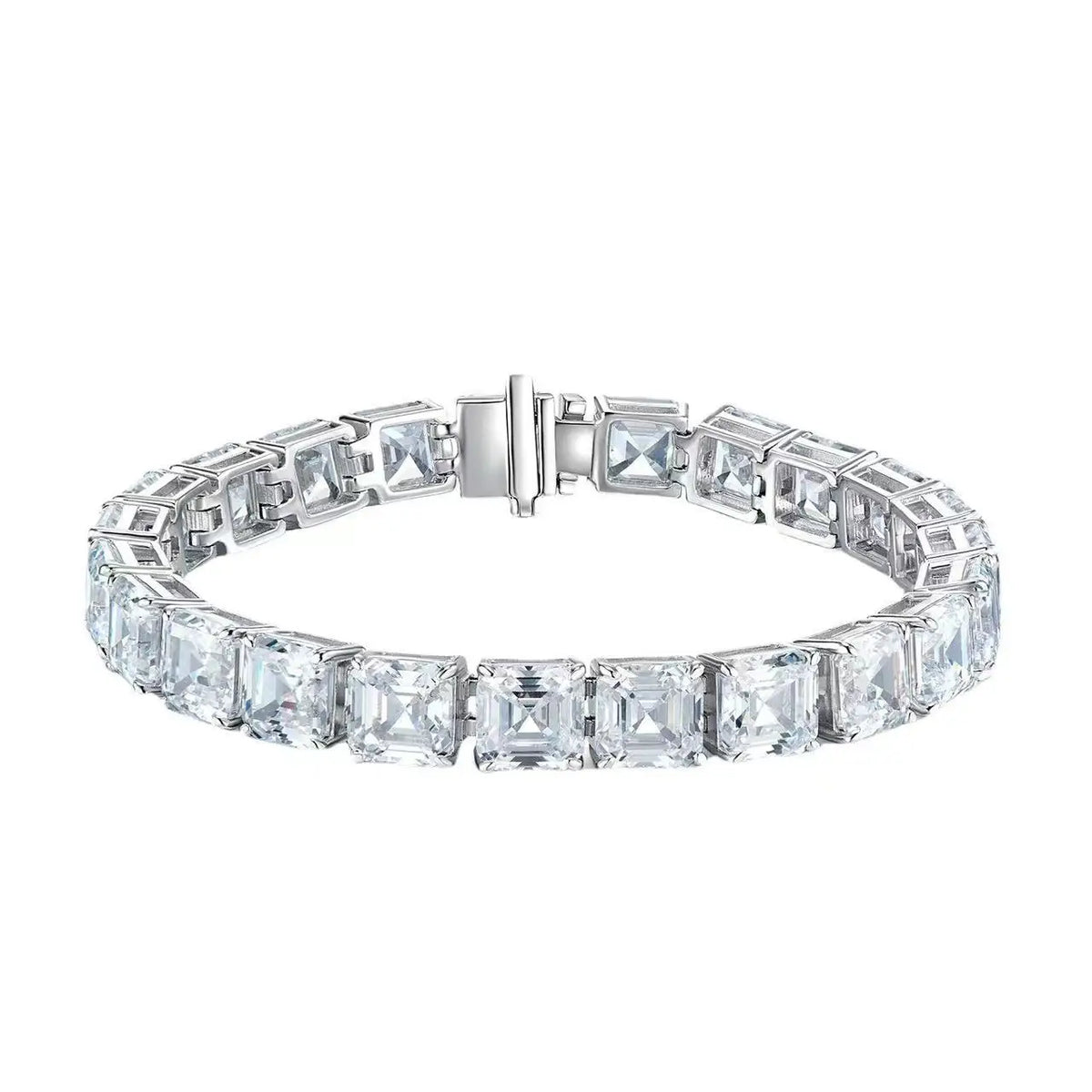 A silver tennis bracelet featuring a row of square-cut clear gemstones in a bezel setting, with a polished clasp closure, shown against a plain white background.