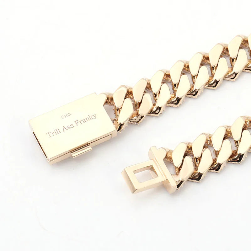 Gold chain bracelet with clasp on a white background