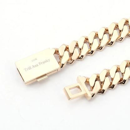 Gold chain bracelet with clasp on a white background