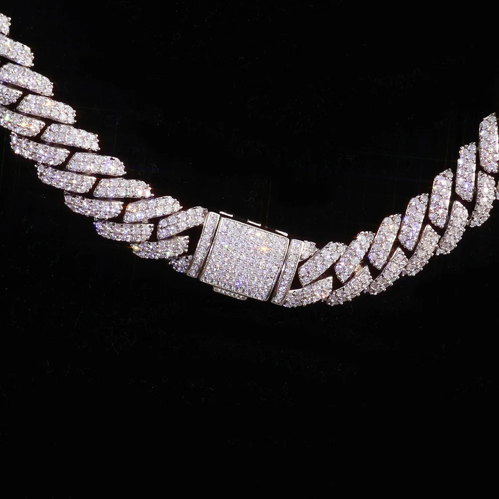 Silver chain necklace with a clasp on a black background
