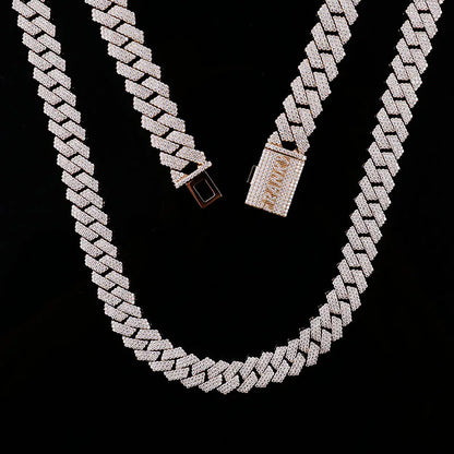 Silver chain necklace with a clasp on a black background
