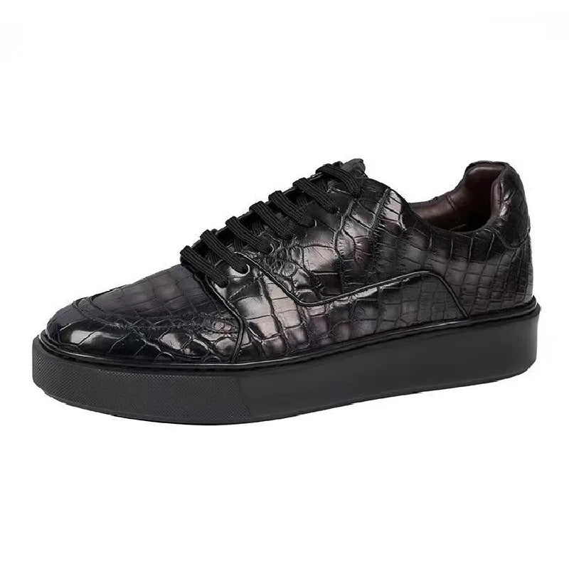 Black hiking shoe with gray sole on a white background