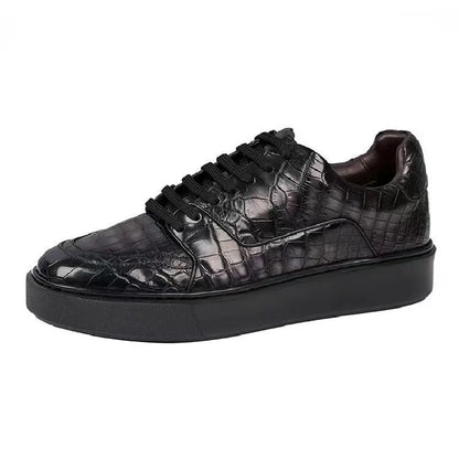 Black hiking shoe with gray sole on a white background