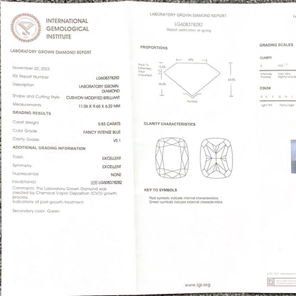 A folded laboratory gemstone report page from the International Gemological Institute, showing diamond grading information, proportions, clarity characteristics, and a key to symbols for a laboratory grown diamond.