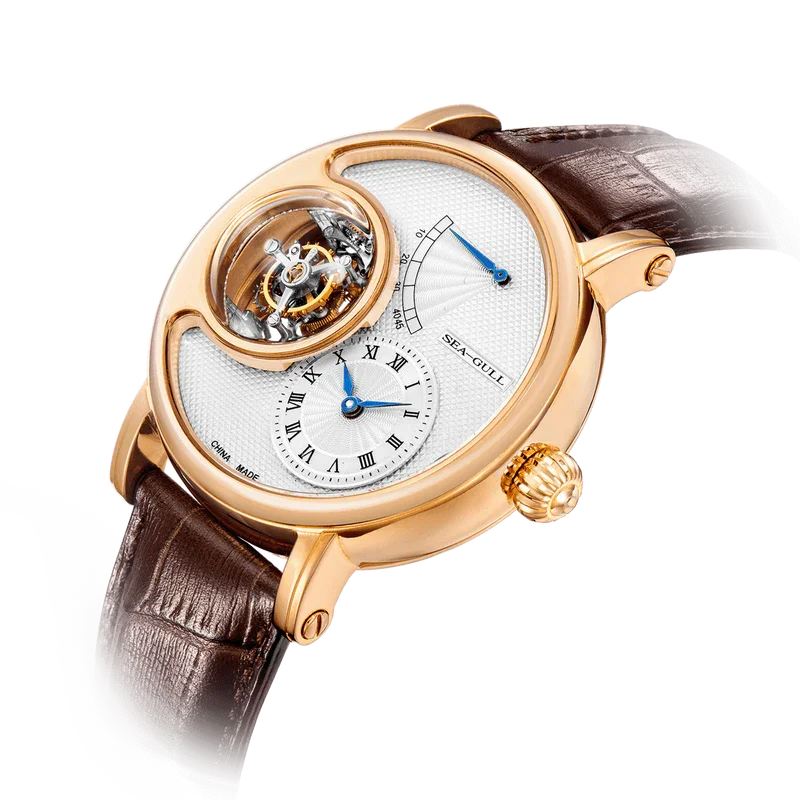 A luxury wristwatch with a gold-tone case, white dial, and brown alligator leather strap, featuring a prominent circular open-heart window showing the inner mechanism.