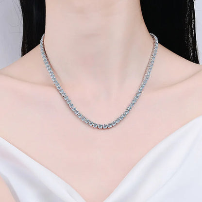 Silver necklace on a mannequin with a white background