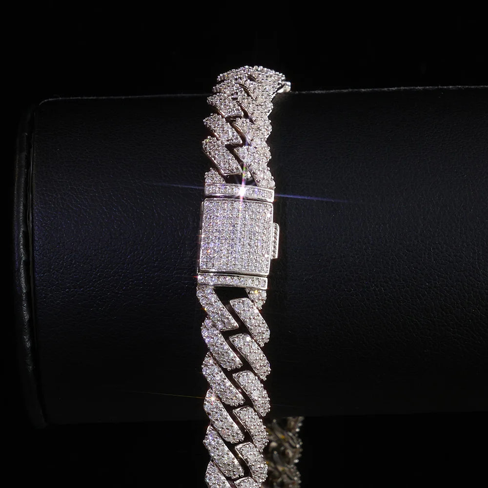 Silver chain bracelet with diamond-like stones on a black background