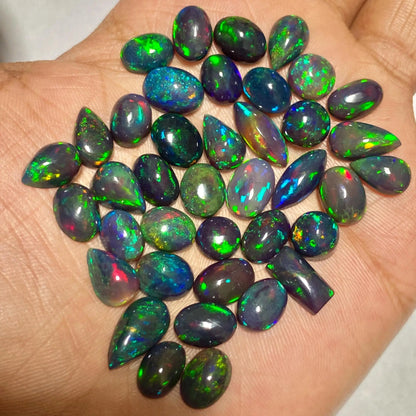 Natural Black Fire Opal Oval Shape Cabochon Smooth Polished Surface Loose Gemstones Multiple Sizes For Jewelry Making
