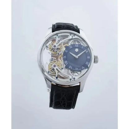 A luxury skeleton watch with a silver-tone case, a blue dial, and a black leather strap, shown against a light gray background.
