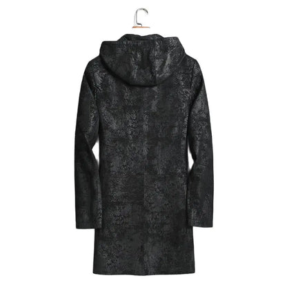 Black textured coat on a hanger against a white background