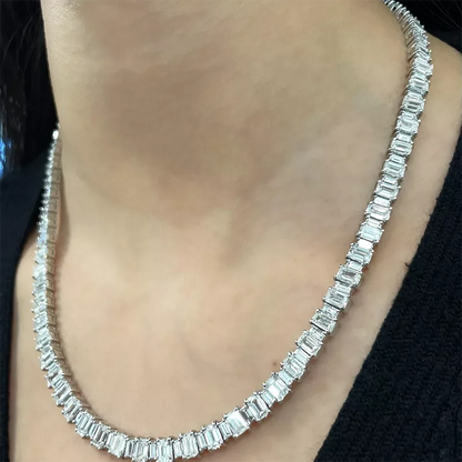 Diamond necklace on a person wearing a black top