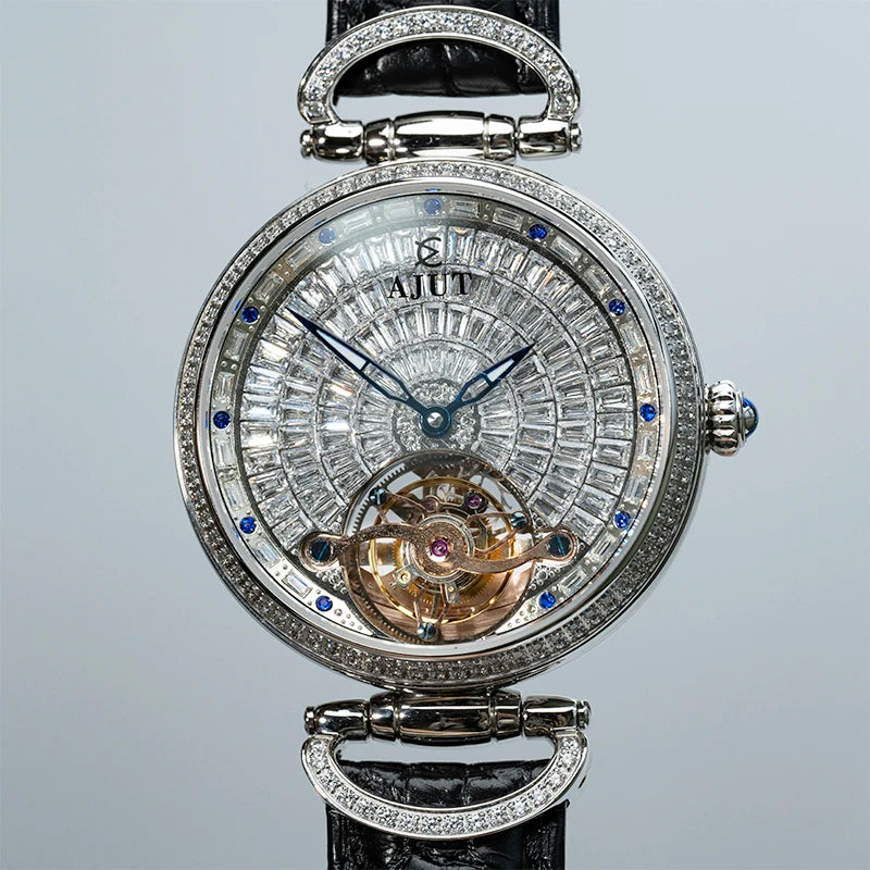 Luxury watch with intricate design and visible brand name on a light gray background
