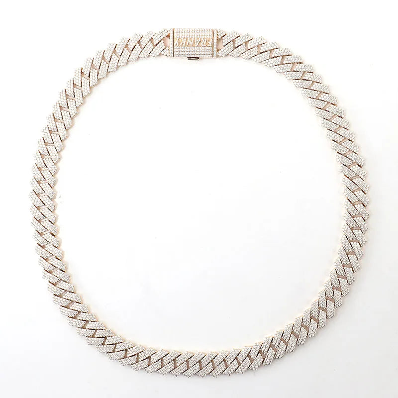 Rose gold chain necklace on a white background