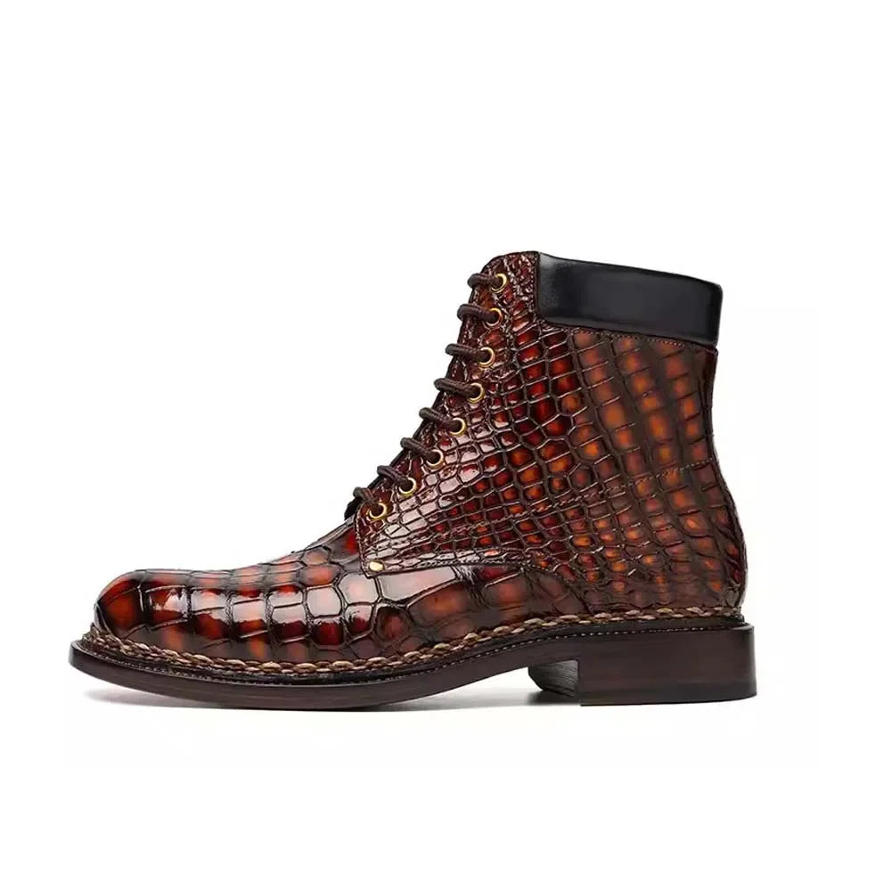 A single brown crocodile-embossed leather lace-up boot with a black collar, shown in a side profile on a white background.