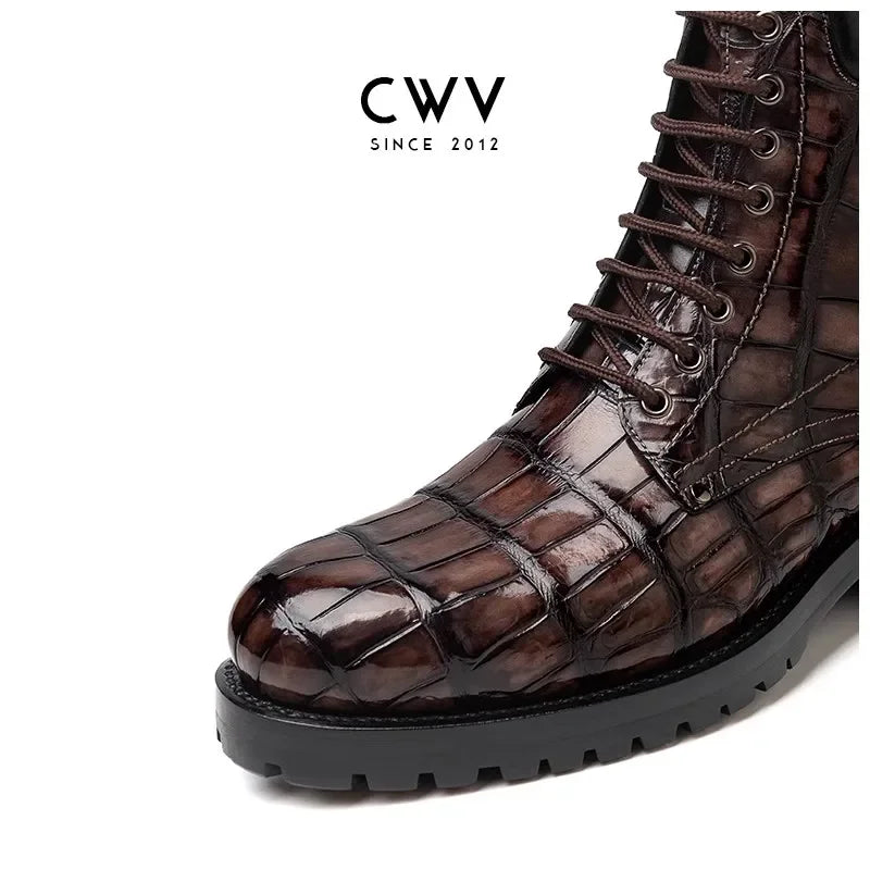A close-up of a dark brown crocodile-embossed lace-up boot with a black lug sole, shown on a white background with the brand name 'CWV' in the upper left.